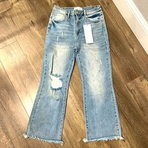 Risen Demin Crop distressed light wash jeans. inseam 25”. Size 30. New with tags